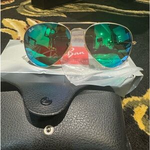New Rayban Avistor Sunglasses with green reflective lenses.